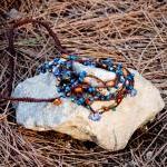 Teal orange brown beaded ve..