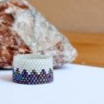 Custom band ring. Forest dr..