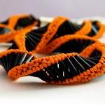 Statement Black Orange spir..