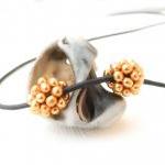 Golden pine-cones. Beaded b..