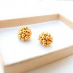 Golden pine-cones. Beaded b..