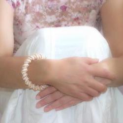 Wedding Pearl white golden peach Cellini spiral. Beaded bangle bracelet. Bridesmade party