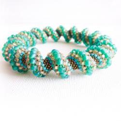 Spring teal green peach turquoise bronze beaded Cellini spiral bracelet. fashion jewelry
